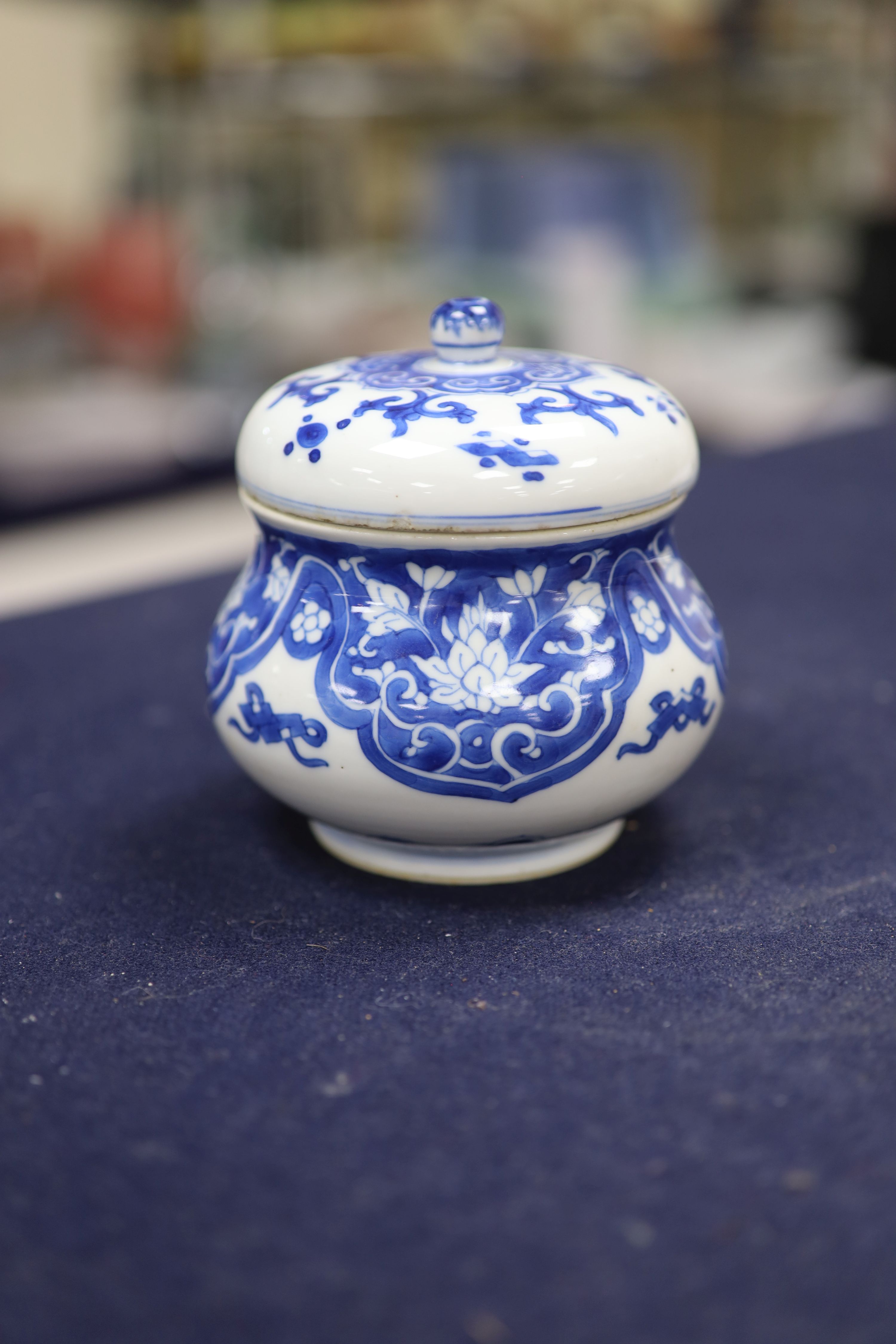 A pair of Chinese blue and white dishes and a similar jar and cover, tallest 12cm